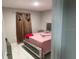 Well-lit bedroom featuring a stylish bed, modern decor, and cozy ambiance at 1393 Axel Cir, Winter Haven, FL 33880