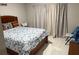 Cozy bedroom featuring a comfortable bed, stylish linens, and soft natural lighting at 1393 Axel Cir, Winter Haven, FL 33880