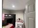 Bedroom with bunkbeds and a desk, perfect for a or teenager at 1393 Axel Cir, Winter Haven, FL 33880