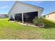 Landscaped backyard with rock garden at 1402 Colonial Ct, Winter Haven, FL 33884