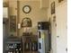 Garage with utility sink, water heater, and storage at 1402 Colonial Ct, Winter Haven, FL 33884