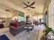 Cozy sunroom with comfortable seating and plenty of natural light at 1402 Colonial Ct, Winter Haven, FL 33884