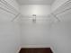 Walk-in closet with carpet floor and wire shelves at 1409 Berkley Ct, Winter Haven, FL 33880
