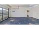 Spacious two-car garage with ample room for storage and organization and access to main house at 1409 Berkley Ct, Winter Haven, FL 33880