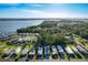 Scenic aerial view of the lakeside community offering waterfront living and lush greenery at 167 Bonnie Dr, Auburndale, FL 33823