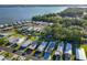 Scenic aerial view of community situated on a lake and canals at 167 Bonnie Dr, Auburndale, FL 33823