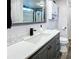 Modern bathroom with a stylish vanity, updated fixtures, and a walk-in shower at 167 Bonnie Dr, Auburndale, FL 33823