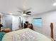 Inviting bedroom with natural light, a ceiling fan, and space for a home office at 167 Bonnie Dr, Auburndale, FL 33823