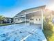 Wide carport provides covered parking for multiple vehicles with lattice trim at 167 Bonnie Dr, Auburndale, FL 33823