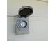Weatherproof electrical outlet on the exterior of the house for convenient outdoor power access at 167 Bonnie Dr, Auburndale, FL 33823