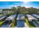 Aerial view of a well-maintained home in a peaceful neighborhood with a spacious driveway at 167 Bonnie Dr, Auburndale, FL 33823