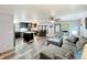 Open-concept living room and kitchen area with modern décor and lots of space at 167 Bonnie Dr, Auburndale, FL 33823