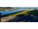 Picturesque waterfront property featuring lush greenery, a boat launch, and serene lake views at 167 Bonnie Dr, Auburndale, FL 33823