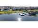 Aerial view of waterfront properties, showing backyard docks and a tranquil lake setting, ideal for waterside living at 169 Summershore Dr, Auburndale, FL 33823