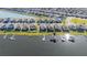 Aerial view showcases waterfront community with private docks and boat access at 169 Summershore Dr, Auburndale, FL 33823