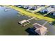 Aerial view of boat dock on the water, adjacent to the property at 169 Summershore Dr, Auburndale, FL 33823