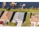Aerial view shows home's location relative to waterfront access and other residences at 169 Summershore Dr, Auburndale, FL 33823