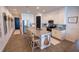 Bright kitchen showcases a spacious island with seating, stainless steel appliances, and a walk-in pantry for ample storage at 169 Summershore Dr, Auburndale, FL 33823