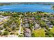 Aerial view of the neighborhood, revealing stunning views of a lake nearby at 2 Bridgewater Dr, Winter Haven, FL 33884