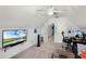 Bonus room offers a sleek TV and a fan for ultimate relaxation and recreation at 2 Bridgewater Dr, Winter Haven, FL 33884