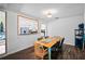 Dining room has plank flooring with access to the kitchen at 2 Bridgewater Dr, Winter Haven, FL 33884