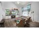 Cozy living room featuring a fireplace, a flat-screen TV, and stylish décor at 2 Bridgewater Dr, Winter Haven, FL 33884