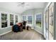 Light-filled sunroom with multiple windows and door, perfect for a relaxing retreat at 2 Bridgewater Dr, Winter Haven, FL 33884