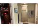 Bathroom with walk-in shower and closet at 214 Brook Ln, Polk City, FL 33868