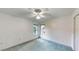 Light and airy bedroom featuring natural light and a ceiling fan at 217 Kent Ct, Haines City, FL 33844