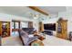 Inviting living room with sliding glass doors, comfortable couches and natural light at 217 Kent Ct, Haines City, FL 33844