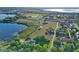Stunning aerial view showcasing the property's expansive lot and scenic lakefront location at 218 Omaha St S S St, Lake Hamilton, FL 33851