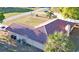 Aerial view of home highlighting a red tile roof, spacious lot, and mature trees at 218 Omaha St S S St, Lake Hamilton, FL 33851