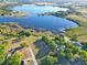 Stunning lakefront property featuring lush greenery, serene waters, and a tranquil atmosphere at 218 Omaha St S S St, Lake Hamilton, FL 33851