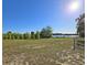 Beautiful lot featuring sprawling green lawn and serene views of the nearby lake at 218 Omaha St S S St, Lake Hamilton, FL 33851