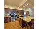 Well-equipped kitchen with stainless steel appliances, granite countertops and ample cabinet space at 218 Omaha St S S St, Lake Hamilton, FL 33851