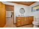 This bathroom includes a vanity, toilet and tiled floor at 225 Wes Mann Rd, Babson Park, FL 33827