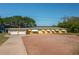 Charming yellow home with an expansive driveway and lots of parking, great for waterfront living at 225 Wes Mann Rd, Babson Park, FL 33827