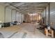 Interior of the metal outbuilding showing a large, open space with a concrete floor at 225 Wes Mann Rd, Babson Park, FL 33827