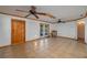 Living space featuring tile flooring, a wood door, and glass doors leading to an outdoor area at 225 Wes Mann Rd, Babson Park, FL 33827