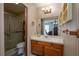 This bathroom is well-lit and has a walk-in shower at 23 Kendra Ct, Winter Haven, FL 33880