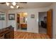 Bedroom includes an attached bathroom and hardwood floors at 23 Kendra Ct, Winter Haven, FL 33880
