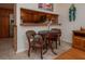 Bright dining area adjacent to the kitchen at 23 Kendra Ct, Winter Haven, FL 33880