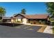 Charming single story home featuring a covered parking area and lush landscaping at 23 Kendra Ct, Winter Haven, FL 33880