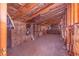 Unfinished attic featuring exposed studs and insulation at 2750 W Lake Hamilton Dr, Winter Haven, FL 33881