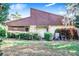 Exterior view with a stone base and well-maintained landscaping at 2750 W Lake Hamilton Dr, Winter Haven, FL 33881