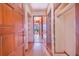 Hallway with wood flooring, and multiple closets and rooms at 2750 W Lake Hamilton Dr, Winter Haven, FL 33881