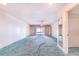Bright living room with large sliding doors to the outside and an adjacent closet at 2750 W Lake Hamilton Dr, Winter Haven, FL 33881