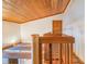 Wooden loft featuring wooden railings and exposed wooden beams at 2750 W Lake Hamilton Dr, Winter Haven, FL 33881
