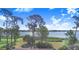 Scenic view of the lake and surrounding greenery from the property at 2750 W Lake Hamilton Dr, Winter Haven, FL 33881