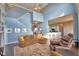 Open-concept living room with soaring ceilings, adjoins the kitchen at 329 Hamilton Shores Ne Dr, Winter Haven, FL 33881